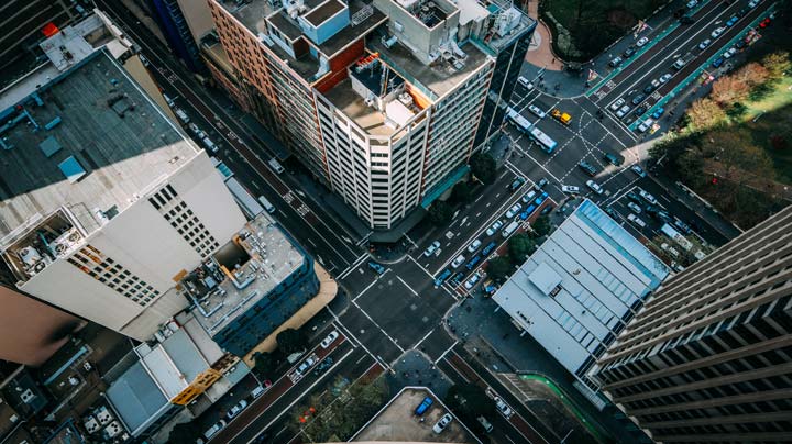 an aerial view of busy urban intersection