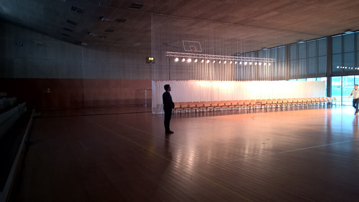 a man in a large empty hall