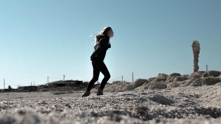 a woman walking in the wind