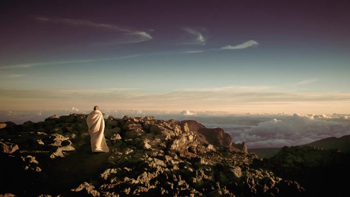 Monk on top of a mountain