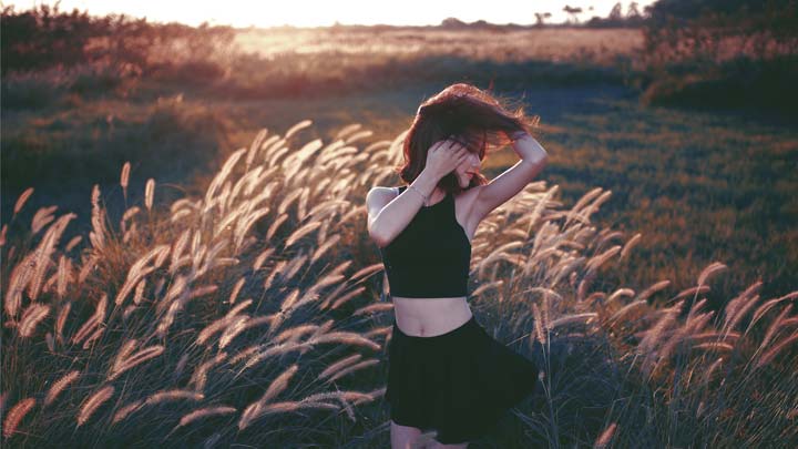 a woman in a field
