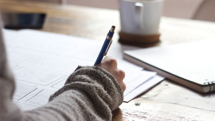Writing at a desk