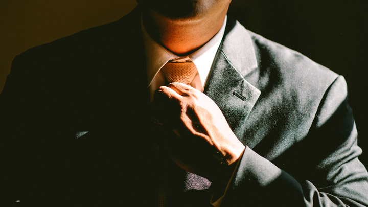 Man in shadows - imagery for "Enigma Machine" by Richard J. Fleming
