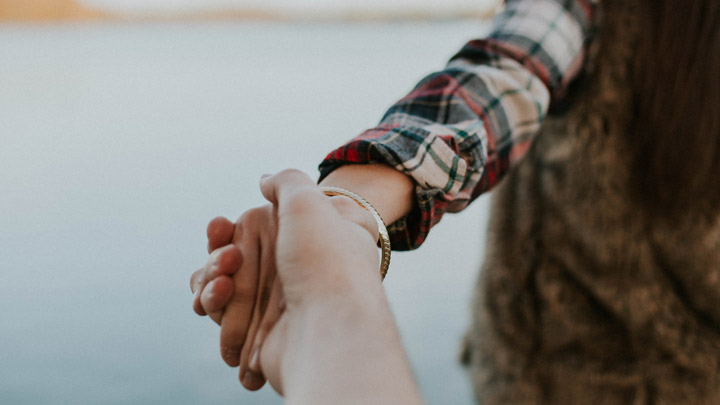 Holding hands - imagery for "Anew" by Linda Grierson-Irish