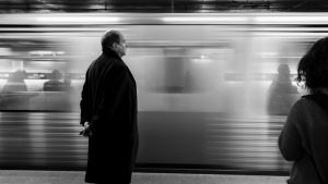 Train by platform, image for "Commuter, 1993" by Kyle Potvin