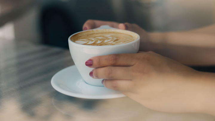 A cup of latte, image for Pumpkin Spice & Tumbleweed by Nicole G. Corrigan