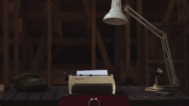 desk with typewriter, image for "Contributor's Note" by David Spicer