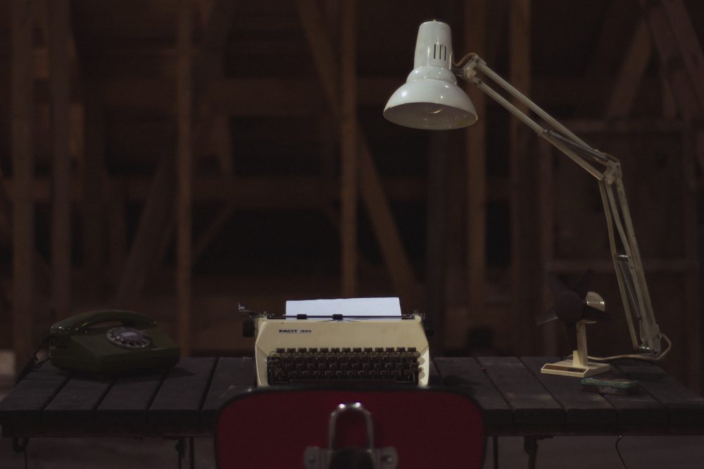 desk with typewriter, image for "Contributor's Note" by David Spicer