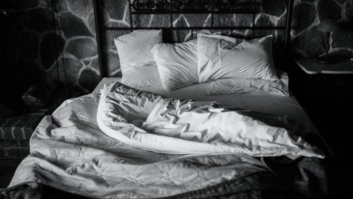 a bed, image for 'Understanding Each Other in the Dark' by Matthew Smart